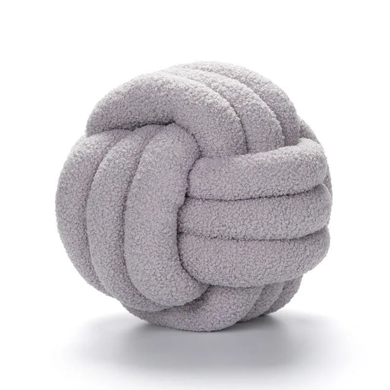 Coussin boule de noeud