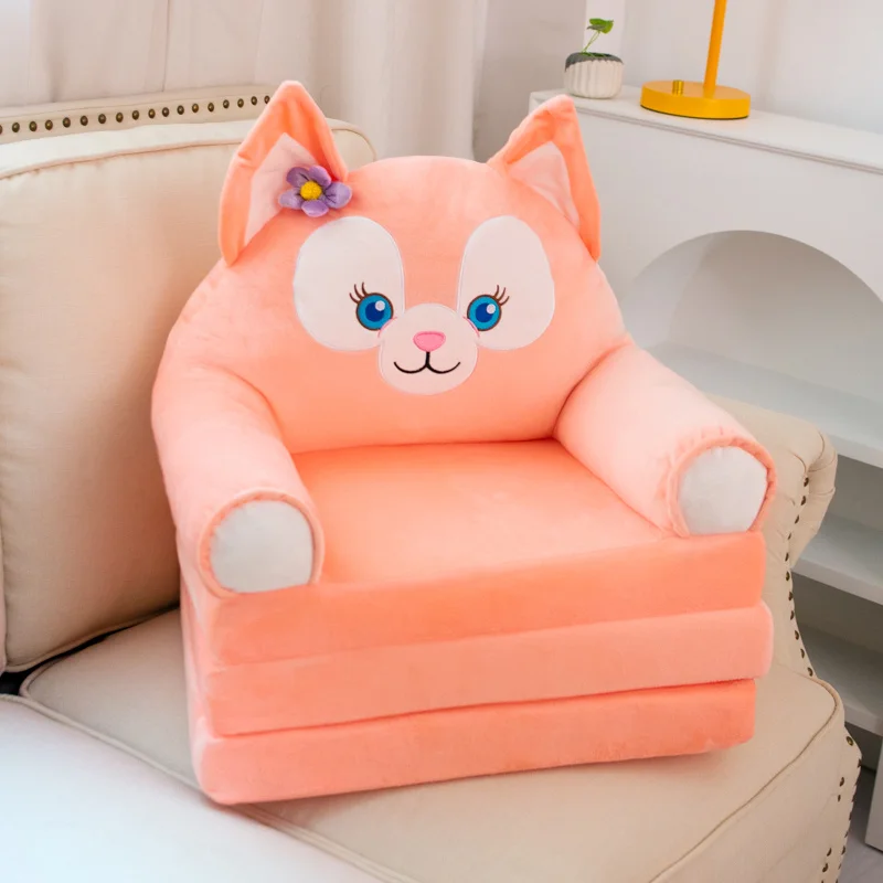 Coussin bébé assis peluche