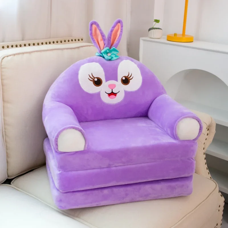 Coussin bébé assis peluche