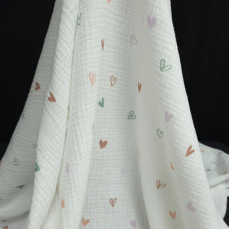 Tissu Double Gaze XNUMX% Coton | Cœurs Pastel sur Fond Blanc