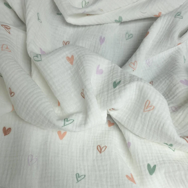Tissu Double Gaze XNUMX% Coton | Cœurs Pastel sur Fond Blanc