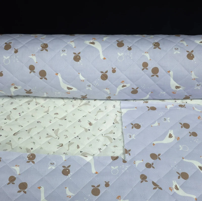 Coton matelassé réversible | Oies bleues & jardin ivoire