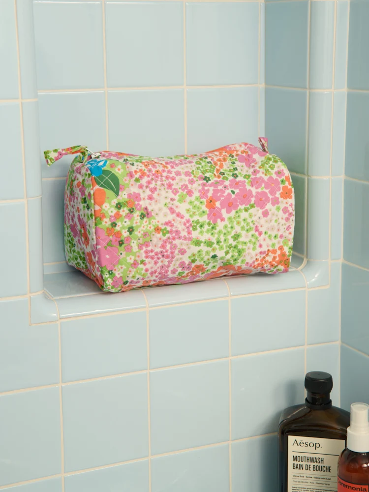 Trousse de toilette matelassée ronde