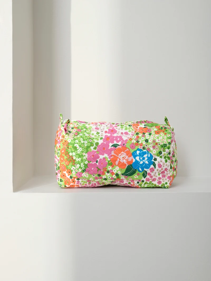 Trousse de toilette matelassée ronde