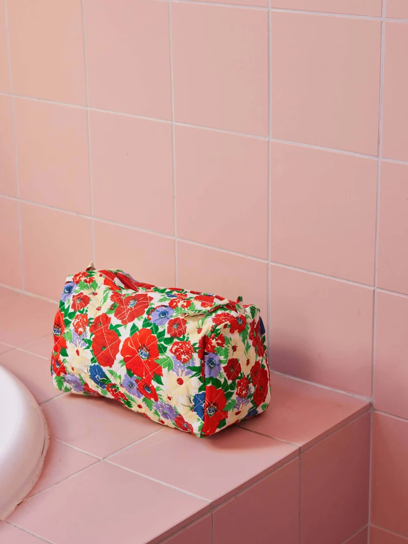 Trousse de toilette matelassée ronde