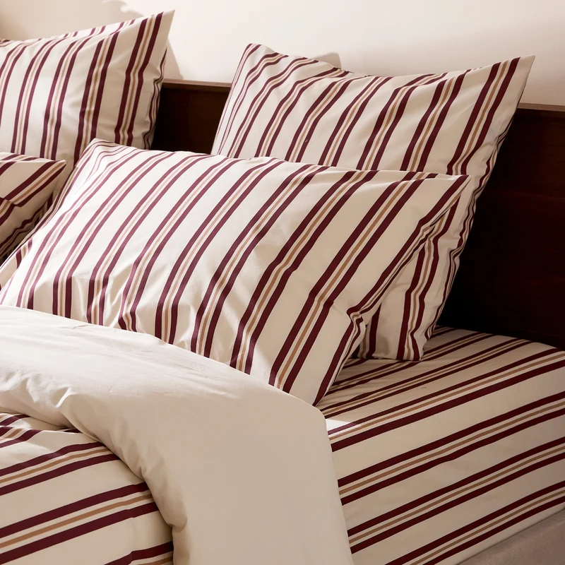 Le drap housse rayures bordeaux et noisette