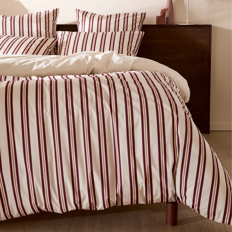 Le drap housse rayures bordeaux et noisette