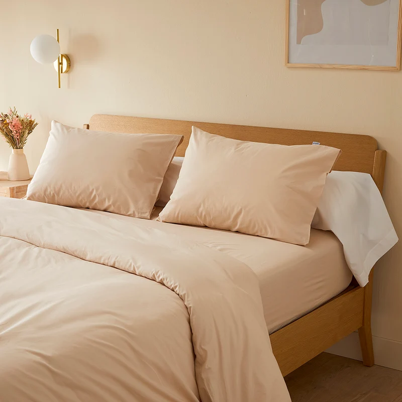 La taie de traversin en percale de coton bio