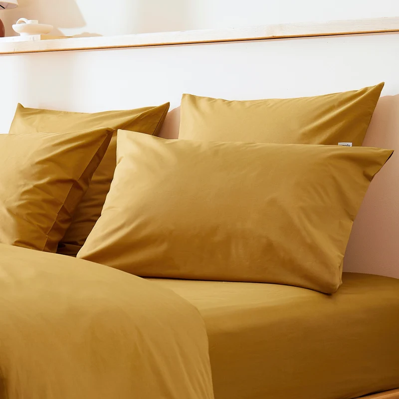 La taie d'oreiller en percale de coton bio
