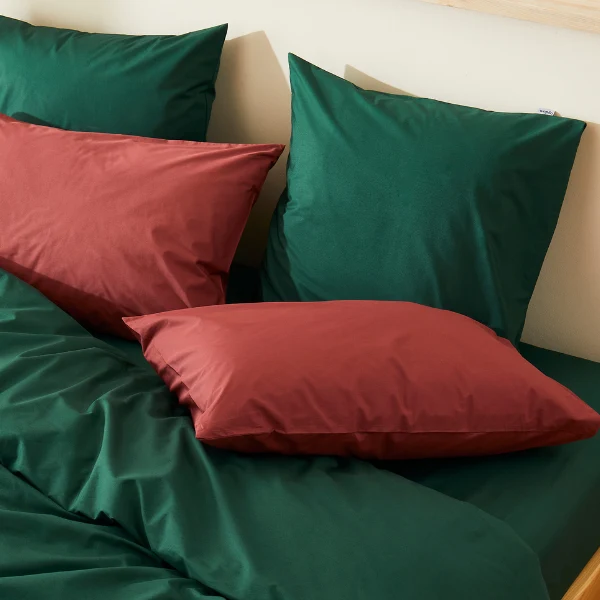 La taie d'oreiller en percale de coton bio