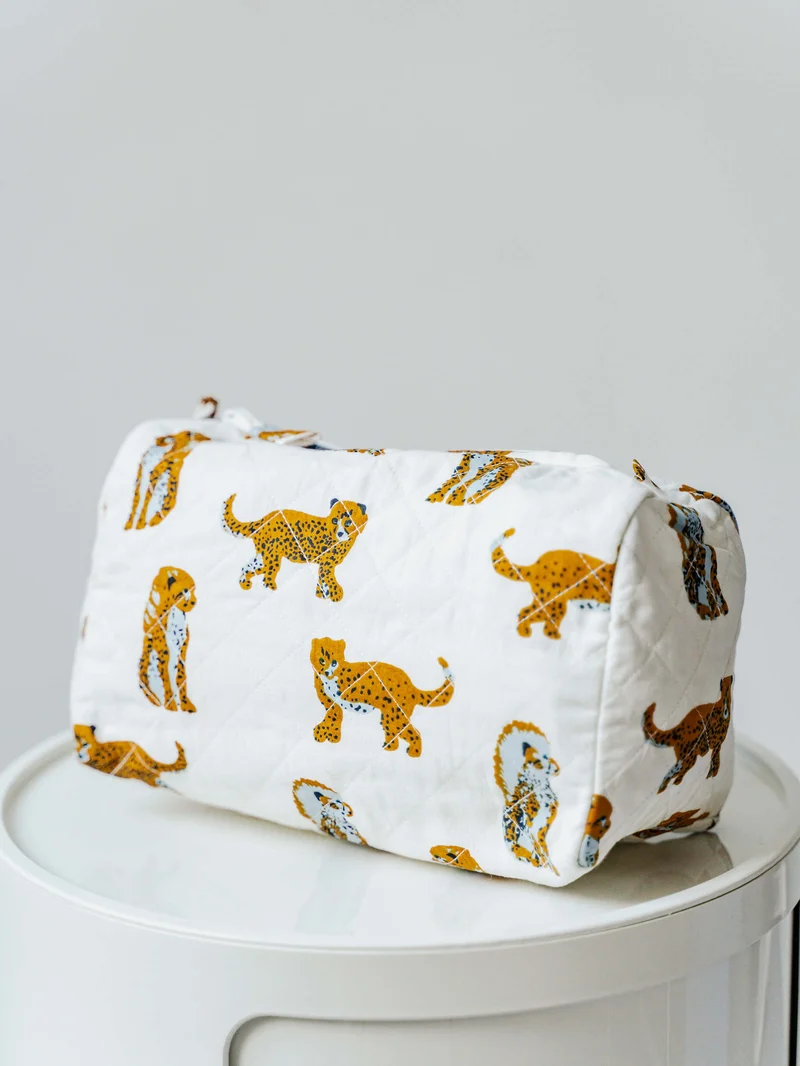 Trousse de toilette matelassée ronde