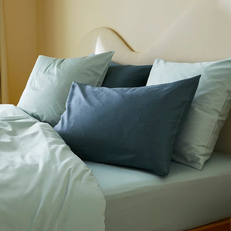 La taie d'oreiller en satin de coton bio