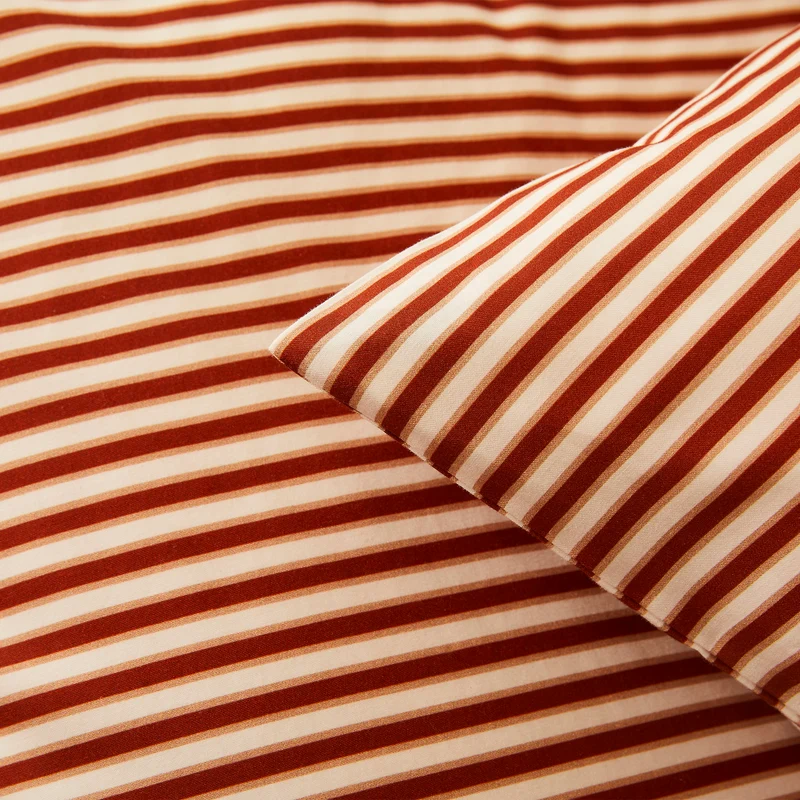 La taie d'oreiller en satin de coton bio
